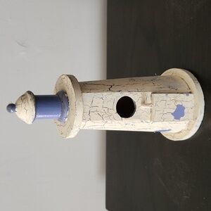 White and Blue Lighthouse Figurine